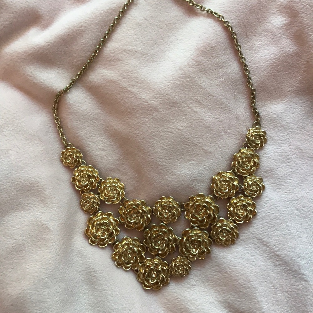 Chunky gold necklace with roses